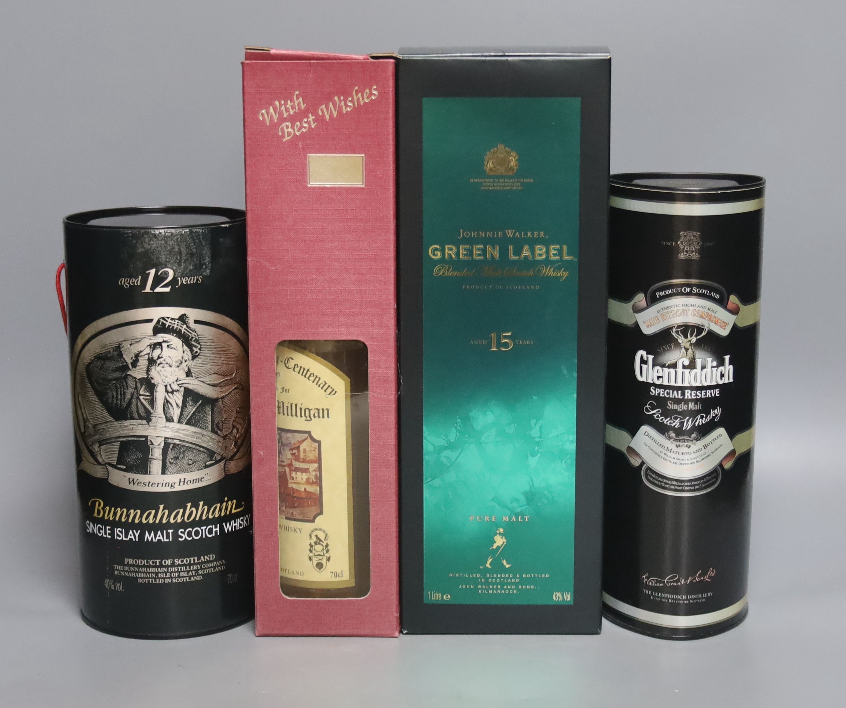 Four assorted malt whiskies: Johnny Walker Green Label, Robert Burns Bi-Centenary, specially selected for James C. Milligan, Bunnahabhain 12 year old Single Islay Malt and Glenfiddich Special Reserve Single Malt